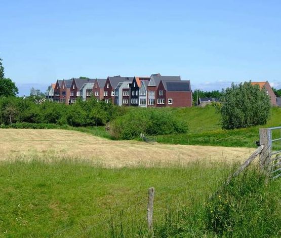 Afbeelding Huizen Lexmond vanaf de dijk gezien